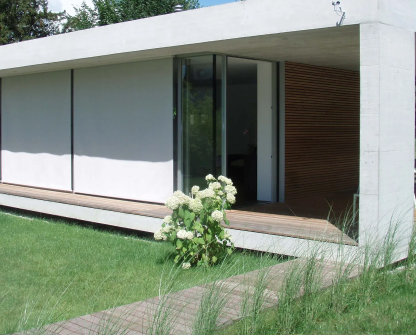 outdoor window shading pictured on a small rectangular house