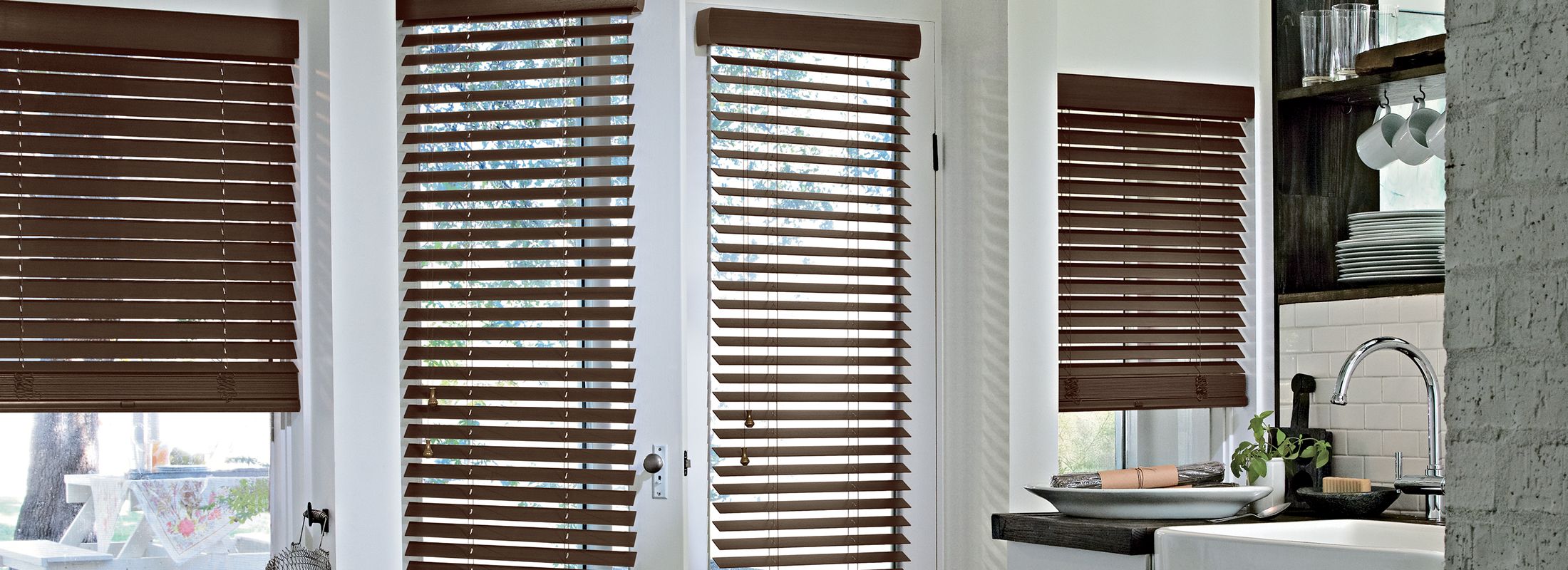 Wood blinds on windows and patio doors